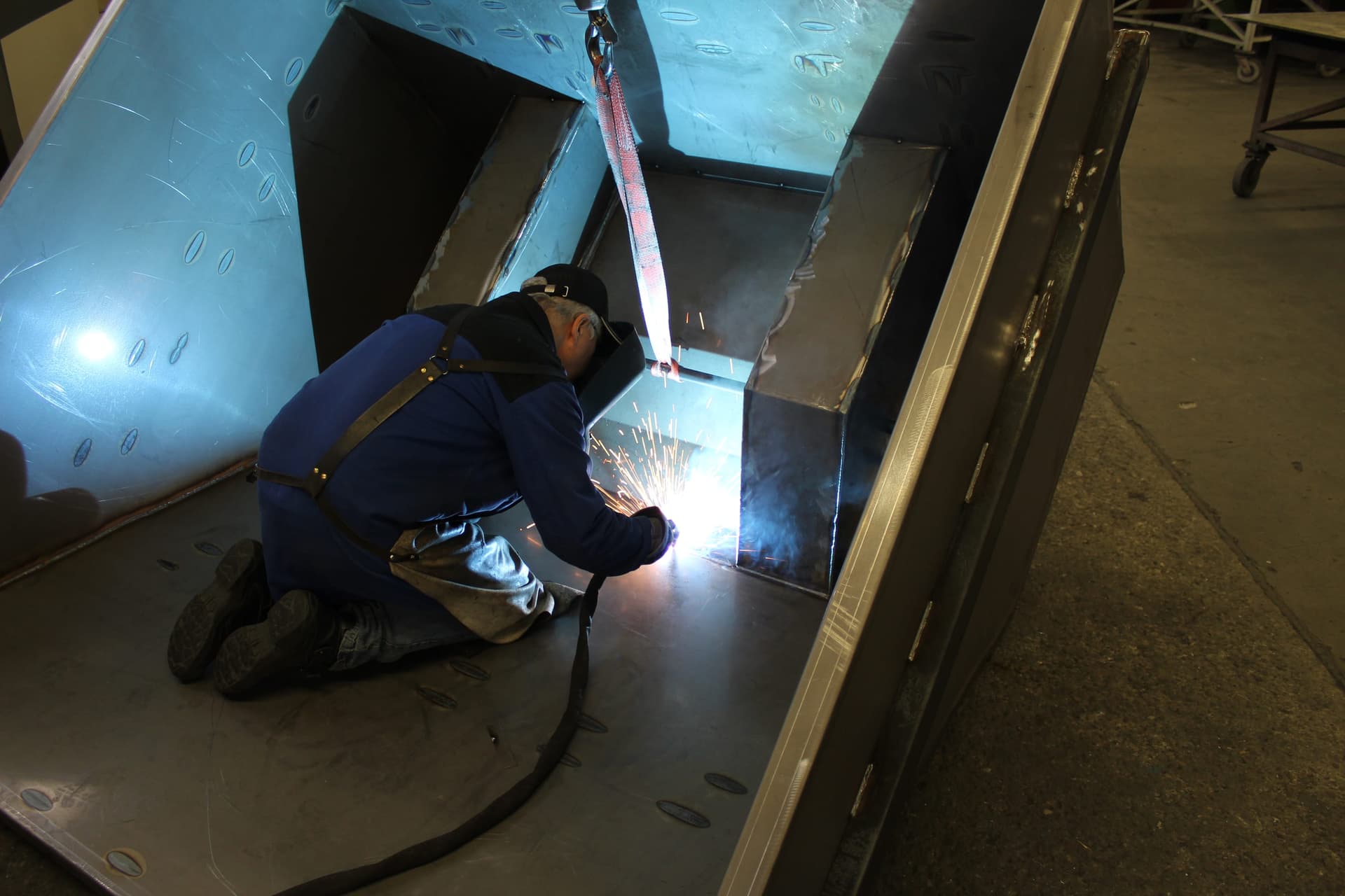 Welder manufacturing an ENITOR steel structure